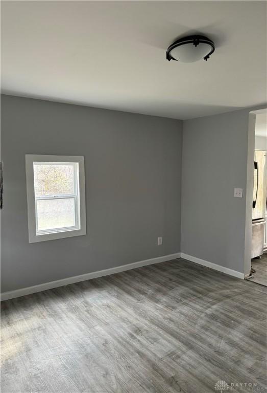 6718 Faversham Rd, Miamisburg, OH 45342 - unfurnished room featuring baseboards and wood finished floors
