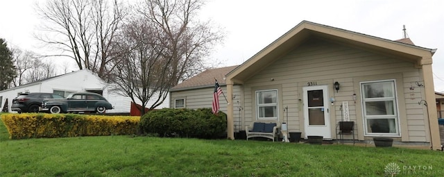 2311 Eden Ln, Dayton, OH 45431 - view of front facade featuring a front lawn