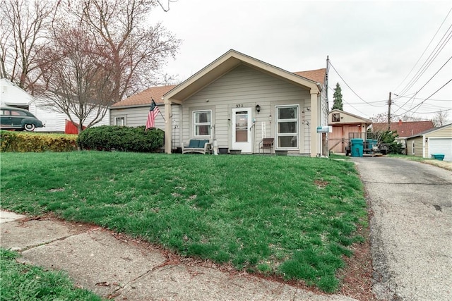 2311 Eden Ln, Dayton, OH 45431 - shotgun-style home with a front yard