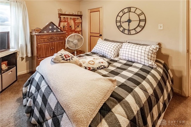 2311 Eden Ln, Dayton, OH 45431 - bedroom with dark carpet and baseboards