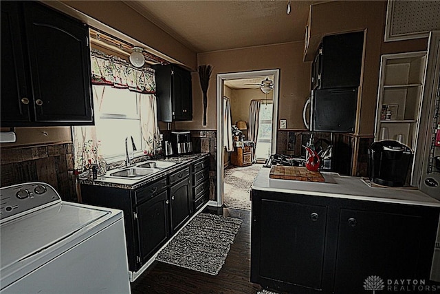 2311 Eden Ln, Dayton, OH 45431 - laundry room featuring washer / clothes dryer, a ceiling fan, and dark wood-type flooring
