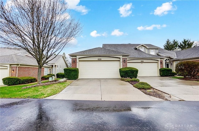 3949 E Summit Ridge Dr, Beavercreek, OH 45430 - traditional-style home with driveway, brick siding, a garage, and roof with shingles