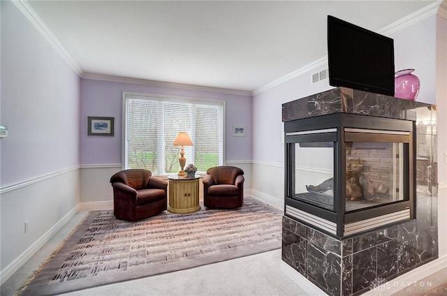 3558 Golden Fox Trl, Lebanon, OH 45036 - sitting room with baseboards, visible vents, a premium fireplace, and crown molding