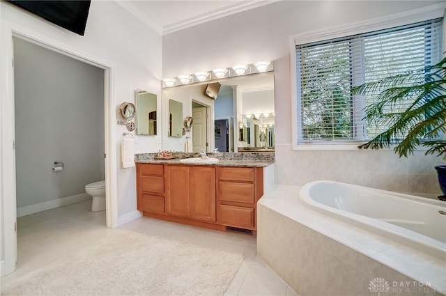 3558 Golden Fox Trl, Lebanon, OH 45036 - bathroom featuring vanity, a bath, tile patterned floors, toilet, and crown molding