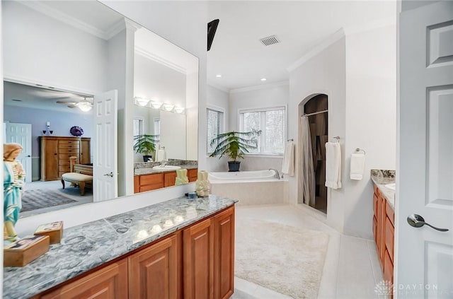 3558 Golden Fox Trl, Lebanon, OH 45036 - full bathroom featuring ornamental molding, two vanities, visible vents, and a shower stall