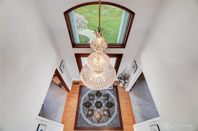 3558 Golden Fox Trl, Lebanon, OH 45036 - foyer entrance featuring a towering ceiling and wood finished floors