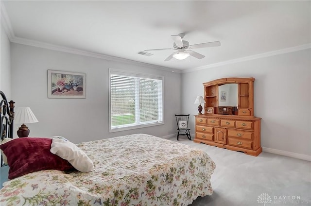 3558 Golden Fox Trl, Lebanon, OH 45036 - bedroom with crown molding, light colored carpet, visible vents, baseboards, and a ceiling fan