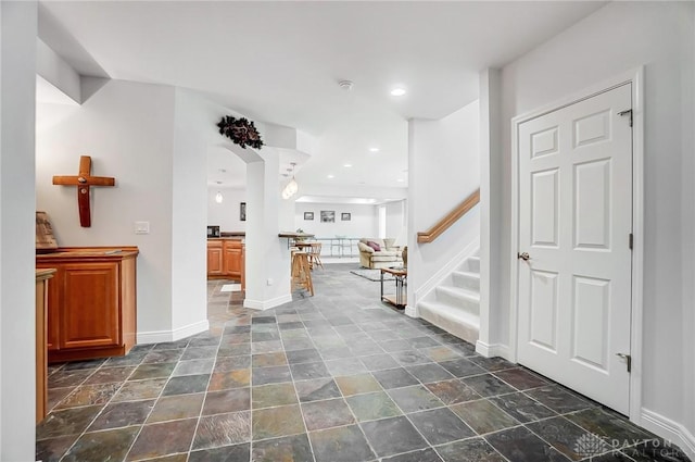 3558 Golden Fox Trl, Lebanon, OH 45036 - interior space with stone finish floor, baseboards, arched walkways, and stairs