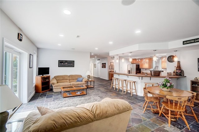 3558 Golden Fox Trl, Lebanon, OH 45036 - living room with baseboards, recessed lighting, and stone finish floor