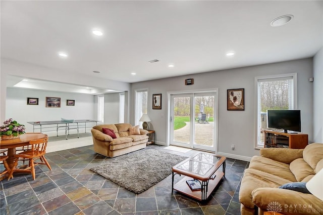 3558 Golden Fox Trl, Lebanon, OH 45036 - living area featuring stone finish flooring, visible vents, recessed lighting, and baseboards