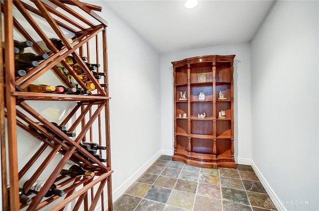 3558 Golden Fox Trl, Lebanon, OH 45036 - wine area with baseboards and stone finish floor