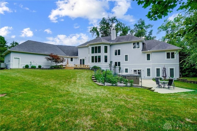 3558 Golden Fox Trl, Lebanon, OH 45036 - rear view of property with a lawn, stucco siding, a patio area, and a chimney