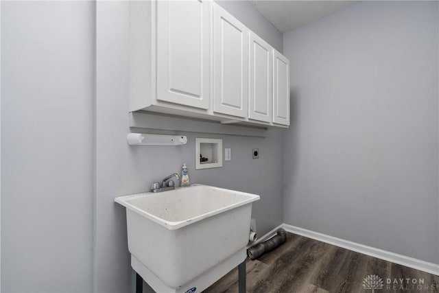 laundry room with hookup for a washing machine, baseboards, a sink, electric dryer hookup, and cabinet space