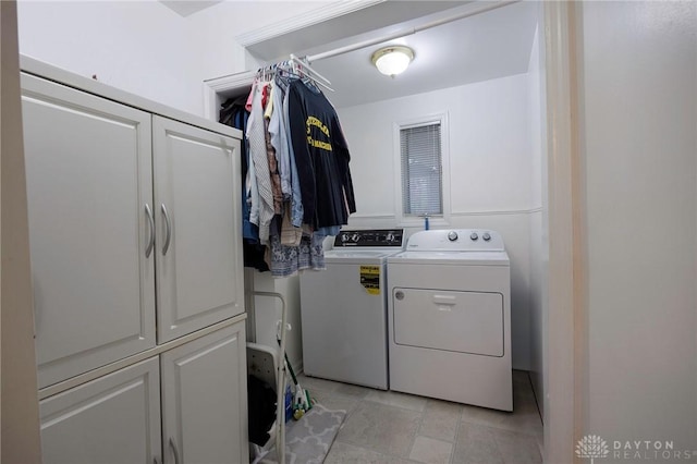 5566 Mad River Rd, Dayton, OH 45459 - laundry room featuring cabinet space and independent washer and dryer