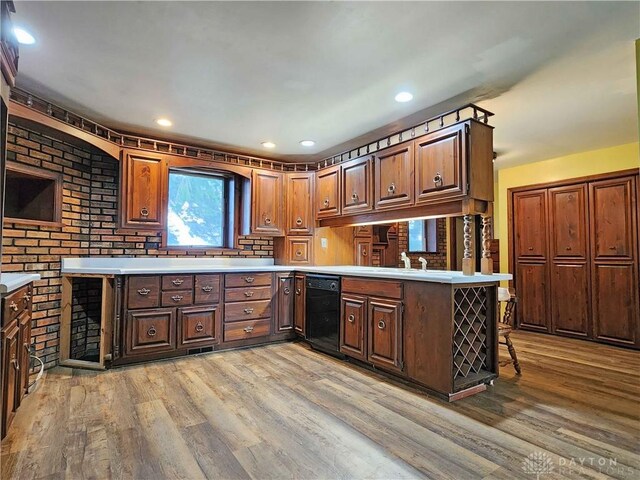5469 Davis Rd, Jamestown Vlg, OH 45335 - kitchen with light countertops, light wood-type flooring, and dishwasher