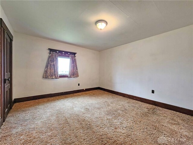 5469 Davis Rd, Jamestown Vlg, OH 45335 - carpeted spare room with baseboards