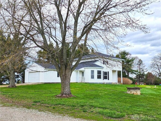 5469 Davis Rd, Jamestown Vlg, OH 45335 - view of front of property with a front lawn and an outbuilding