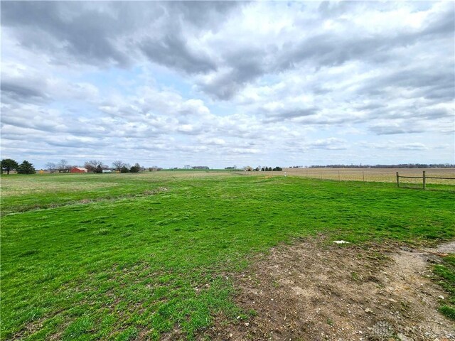 5469 Davis Rd, Jamestown Vlg, OH 45335 - view of yard featuring fence and a rural view