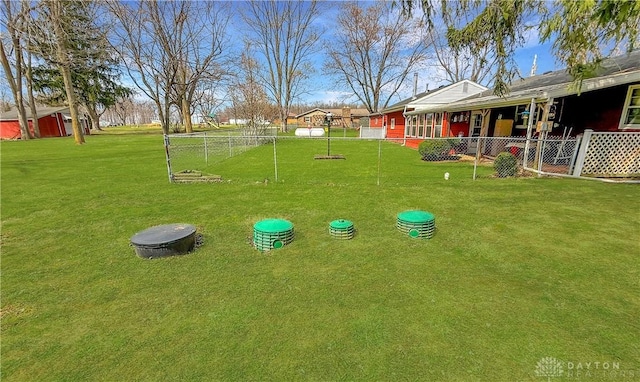 view of yard with fence