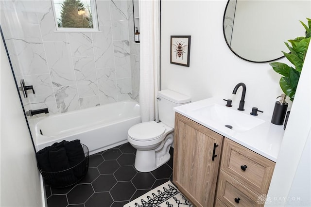 full bathroom featuring toilet, vanity, shower / tub combination, and tile patterned flooring