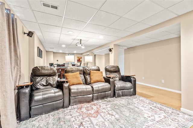 carpeted cinema room with recessed lighting, baseboards, visible vents, and a paneled ceiling