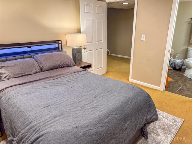carpeted bedroom with baseboards