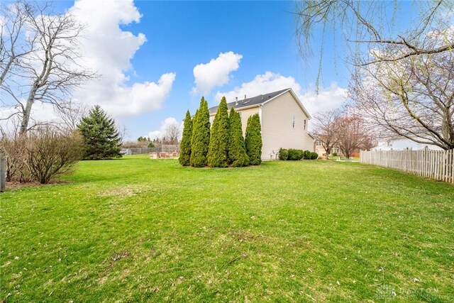 view of yard with fence