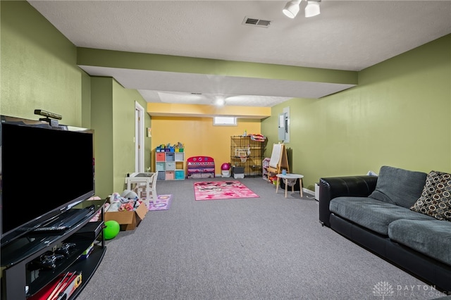 rec room featuring carpet and visible vents