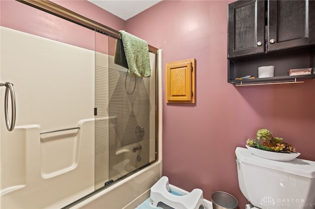 full bath featuring toilet and enclosed tub / shower combo