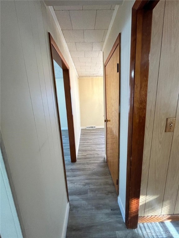 4322 Annapolis Ave, Dayton, OH 45416 - hall with visible vents, wooden walls, and wood finished floors