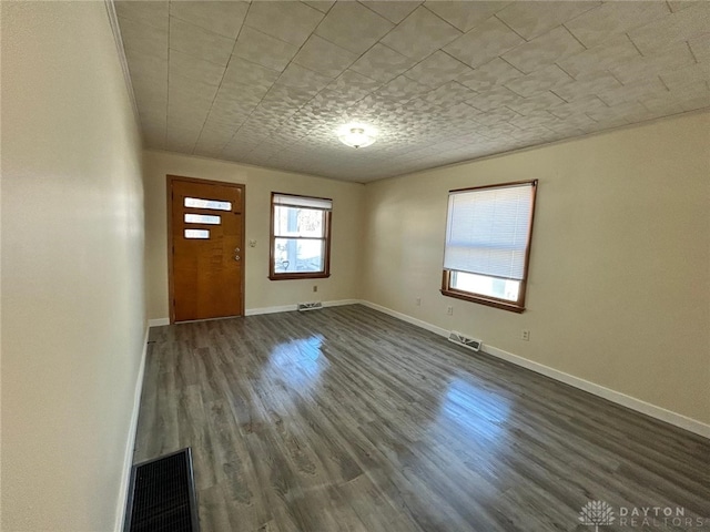 4322 Annapolis Ave, Dayton, OH 45416 - foyer featuring dark wood-style flooring, baseboards, and visible vents
