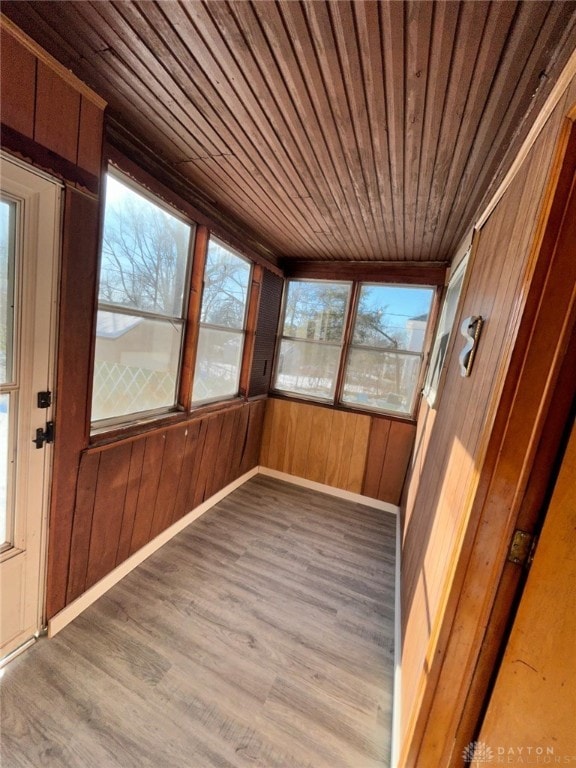 4322 Annapolis Ave, Dayton, OH 45416 - unfurnished sunroom with wood finished floors, wood walls, and wooden ceiling