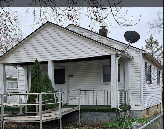 4322 Annapolis Ave, Dayton, OH 45416 - bungalow featuring a chimney and a porch