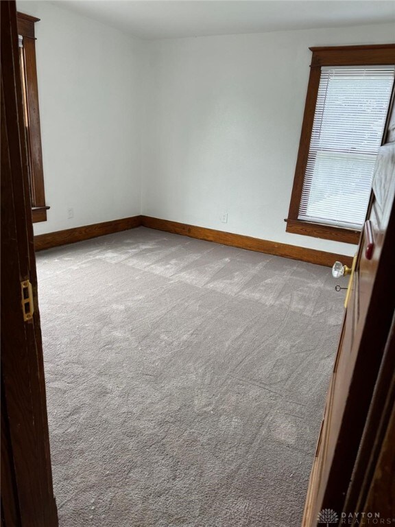 2312 Parkland Ave, Dayton, OH 45405 - empty room with baseboards and carpet floors