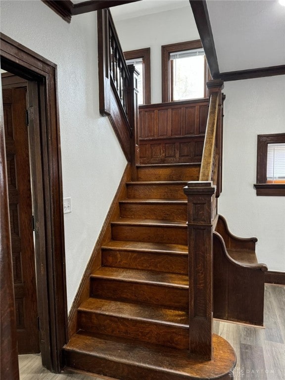 2312 Parkland Ave, Dayton, OH 45405 - staircase featuring baseboards, crown molding, and wood finished floors