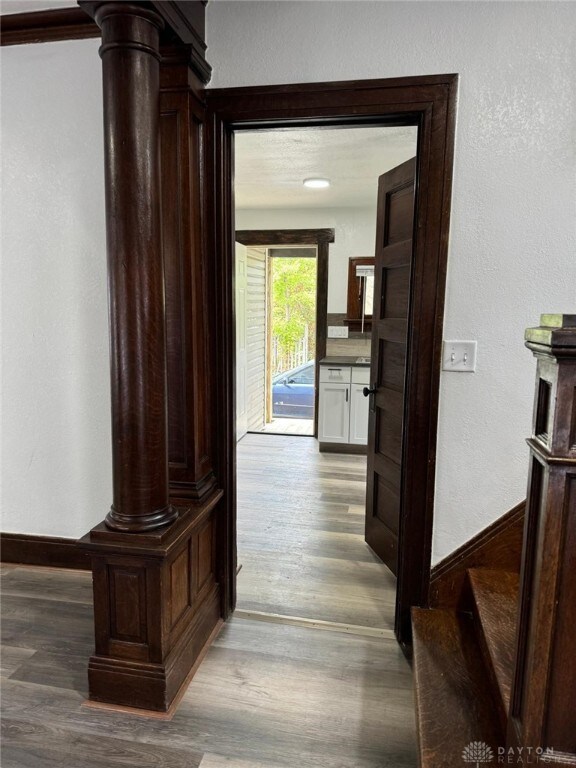 2312 Parkland Ave, Dayton, OH 45405 - corridor with baseboards and wood finished floors