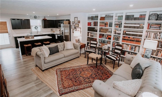 4249 Willow Hills Dr, Dayton, OH 45404 - living area featuring light wood-type flooring and recessed lighting