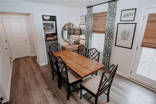 4249 Willow Hills Dr, Dayton, OH 45404 - dining space with wood finished floors and baseboards