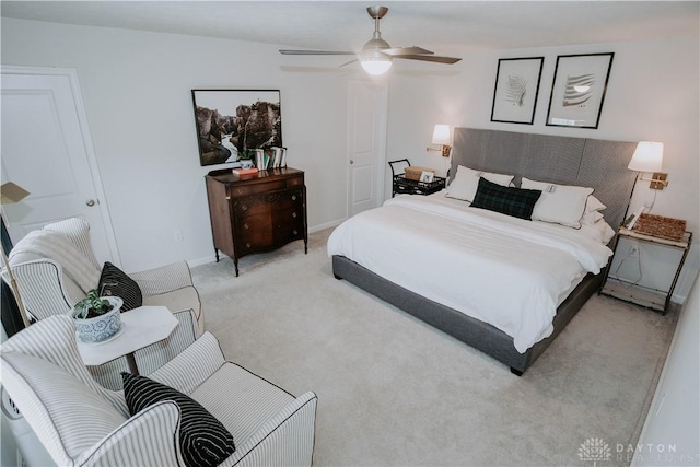 4249 Willow Hills Dr, Dayton, OH 45404 - bedroom featuring light carpet, baseboards, and ceiling fan