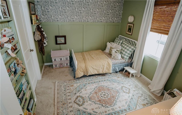 4249 Willow Hills Dr, Dayton, OH 45404 - bedroom featuring a decorative wall, carpet, and a wainscoted wall