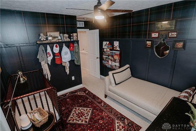 4249 Willow Hills Dr, Dayton, OH 45404 - mudroom featuring ceiling fan, carpet, and a textured ceiling