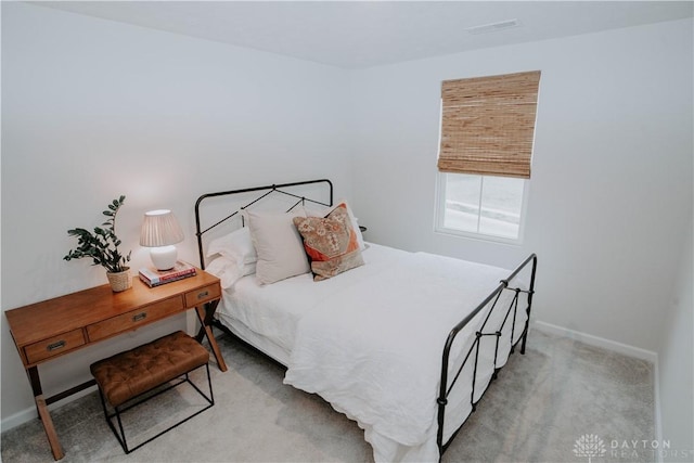4249 Willow Hills Dr, Dayton, OH 45404 - bedroom featuring baseboards and light carpet