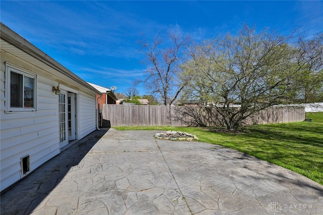 view of patio / terrace featuring fence