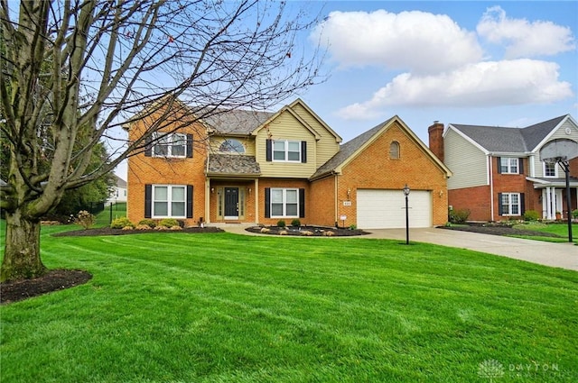 433 Vincent Ct, Middletown, OH 45042 - view of front of property with driveway, brick siding, a front lawn, and a garage