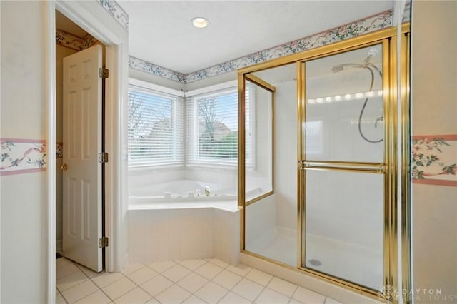 433 Vincent Ct, Middletown, OH 45042 - full bathroom featuring a bath, a stall shower, and tile patterned flooring