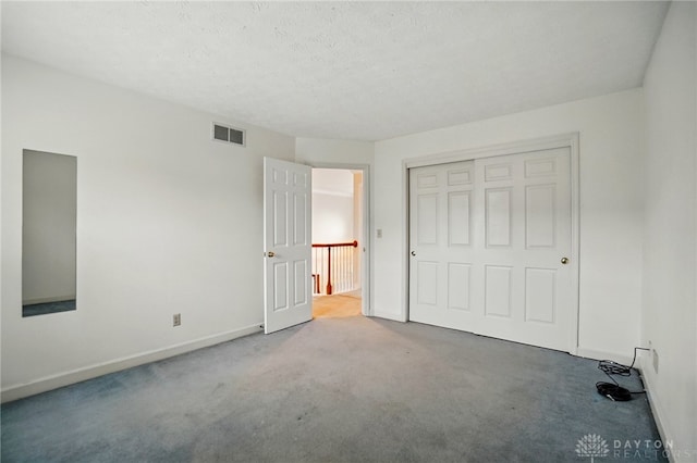 433 Vincent Ct, Middletown, OH 45042 - unfurnished bedroom with carpet floors, baseboards, and a closet