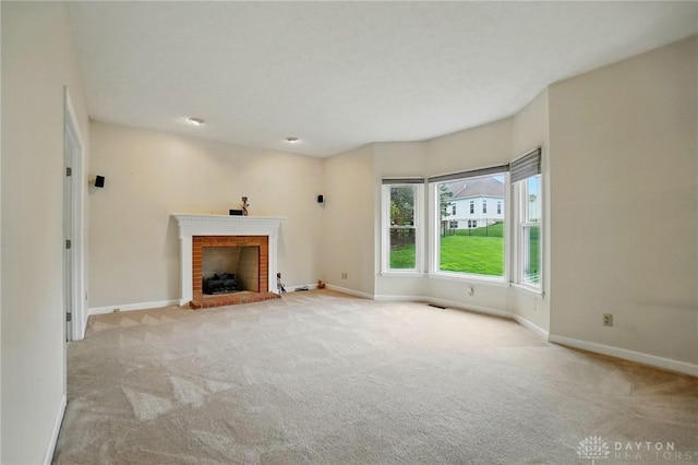 433 Vincent Ct, Middletown, OH 45042 - unfurnished living room with carpet floors, a fireplace, and baseboards