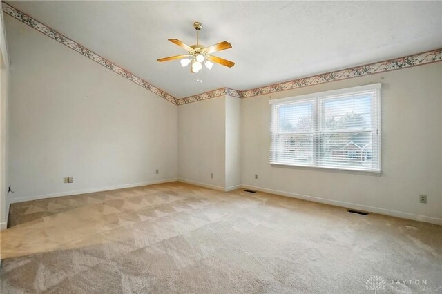 433 Vincent Ct, Middletown, OH 45042 - unfurnished room featuring light colored carpet, ceiling fan, and baseboards