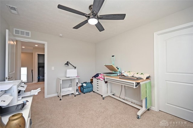 recreation room with carpet flooring, visible vents, baseboards, and ceiling fan