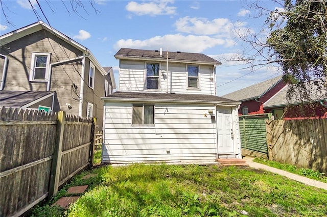 578 Wyoming St, Dayton, OH 45410 - back of property featuring a fenced backyard and a lawn